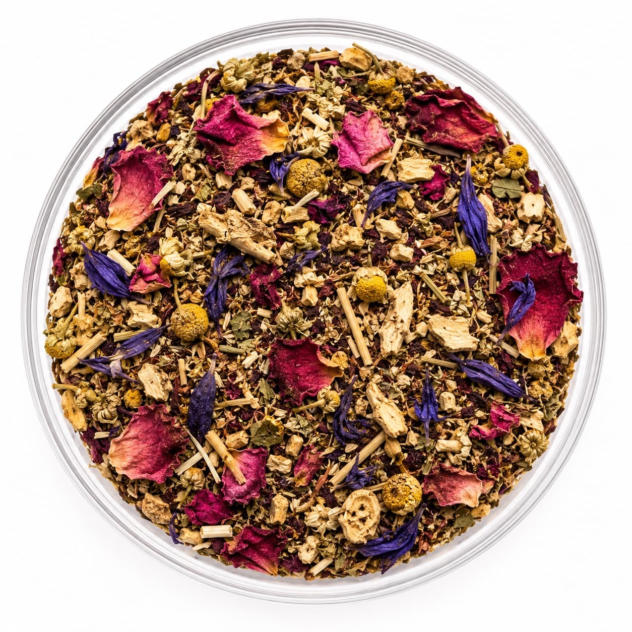 Sacred Intimacy™ loose-leaf blend in a glass bowl — chamomile heads and violet blue lotus petals over pale maca root, rose petals and cut oatstraw